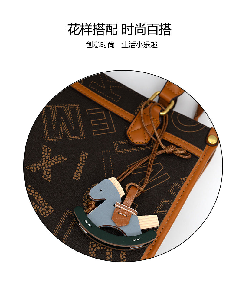 Leather decorative small Trojan horse pendant female car keychain rearview mirror pendant rocking Trojan bag pendant wholesale