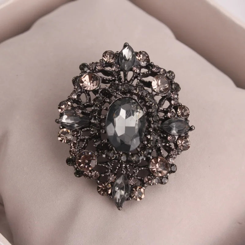 Vintage - Style Brooch, Metal Base with Dark Crystals, Gorgeous Pin with Ornate Hollow Design, Ideal for Coat & Gown Decoration