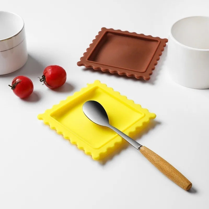 1pc Cartoon Biscuit-Shaped Soup Spoon Rest - Heat Insulating and Anti-Scalding Silicone Mat for Kitchen Gadgets