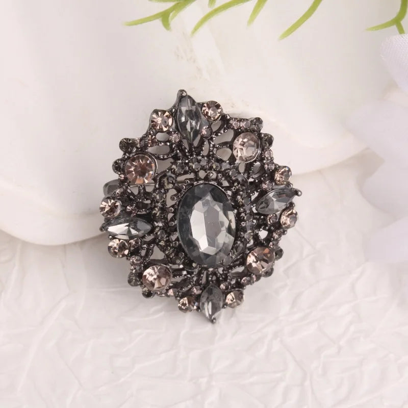 Vintage - Style Brooch, Metal Base with Dark Crystals, Gorgeous Pin with Ornate Hollow Design, Ideal for Coat & Gown Decoration
