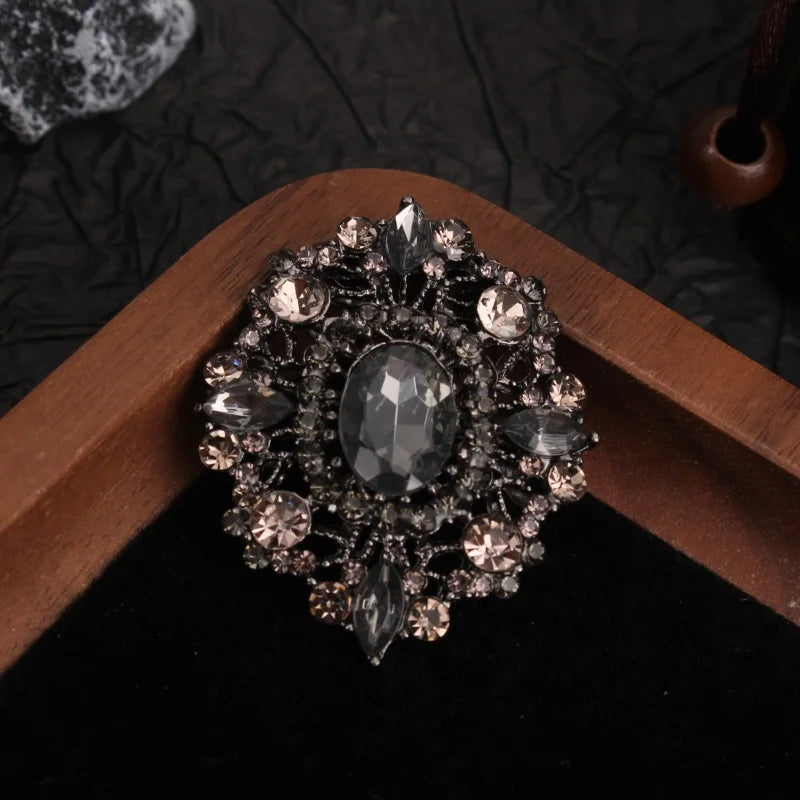 Vintage - Style Brooch, Metal Base with Dark Crystals, Gorgeous Pin with Ornate Hollow Design, Ideal for Coat & Gown Decoration